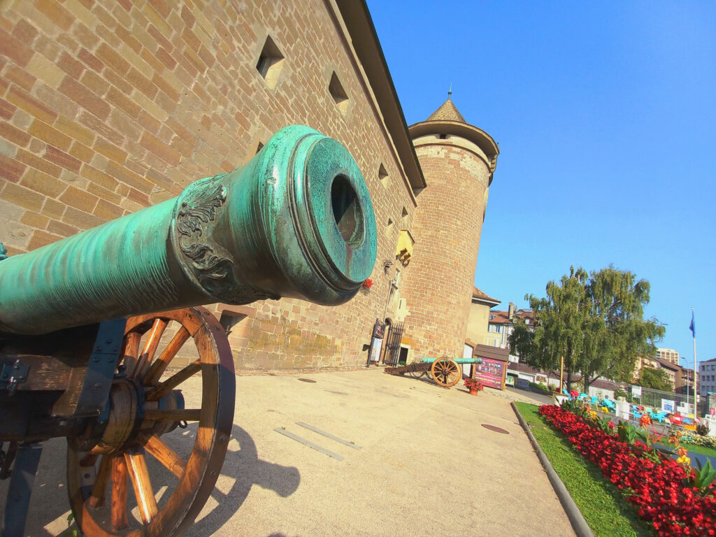 Historic cannon guarding the medieval Château de Morges castle in Morges, Vaud, switzerland
