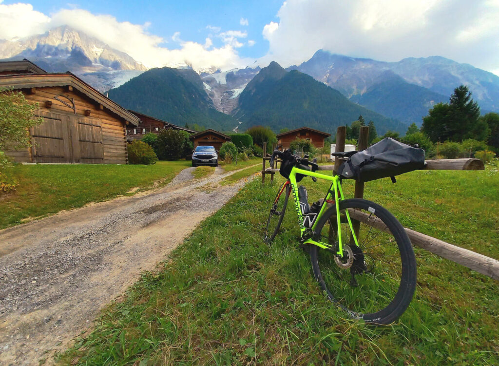 Road bike in Chamonix-Mont-Blanc with the Mont Blanc massif parthly hidden by clounds in the background