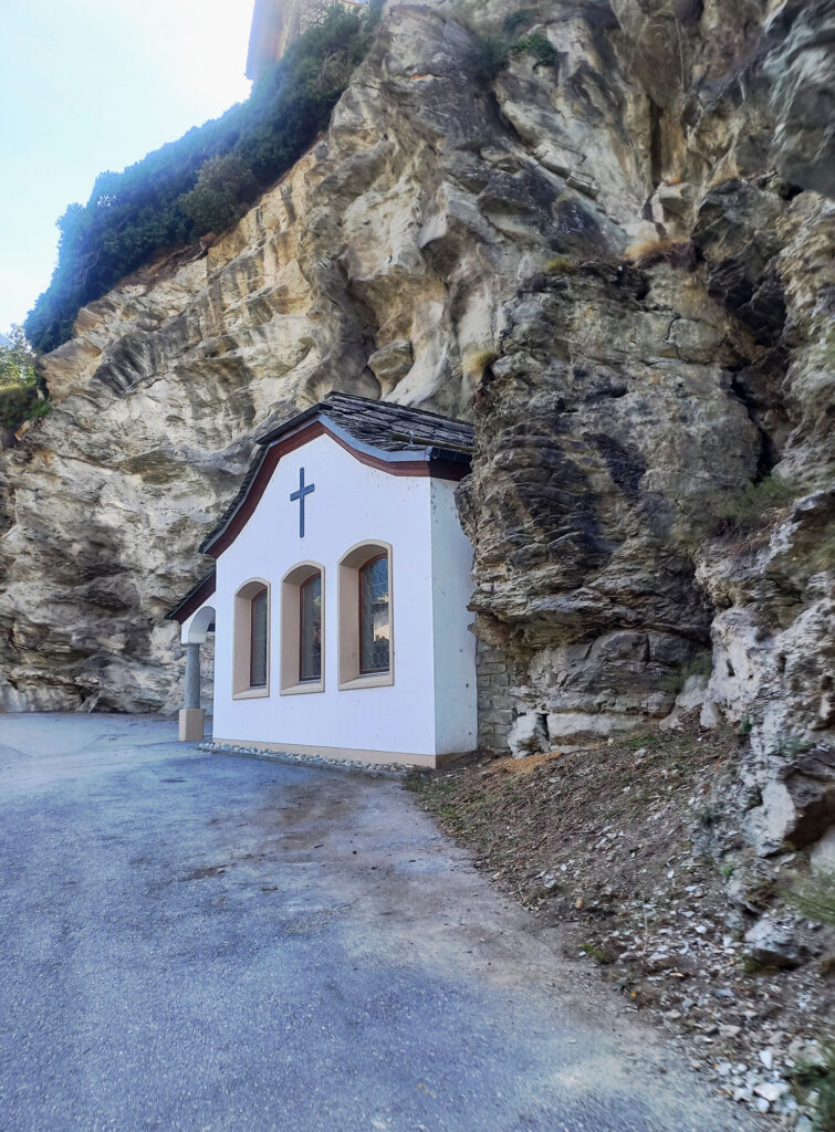 small chapel in rock wall on the road to Zermatt