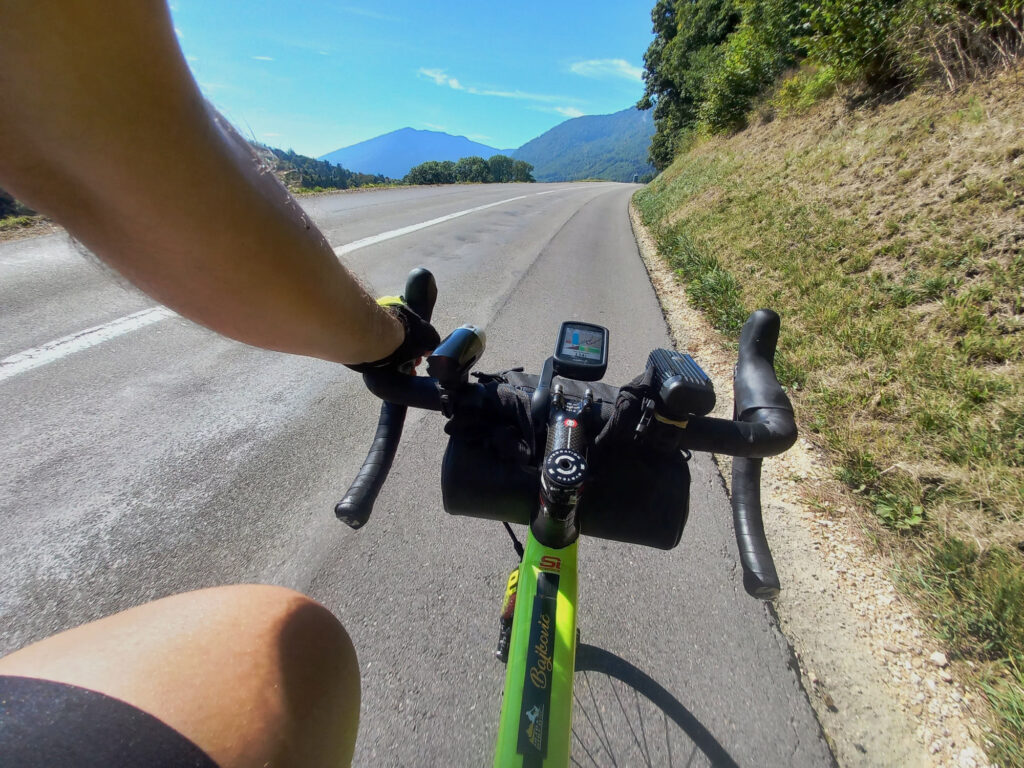cockpit view during a road bike climb through the Swiss Jura mountains