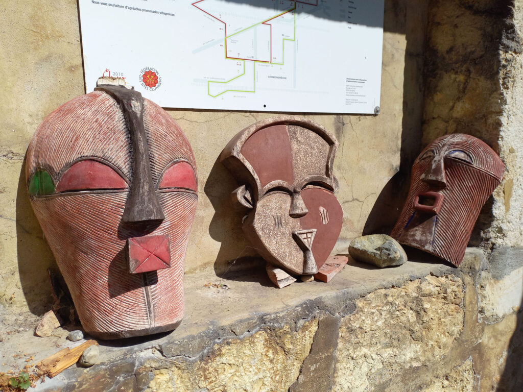 mysterious wooden masks discovered during a cycling trip near Lake Neuchâtel, Switzerland
