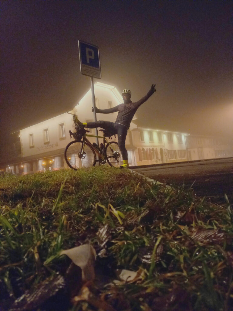 Cycling selfie in the foggy Swiss village of Holderbank during a cold winter night ride home