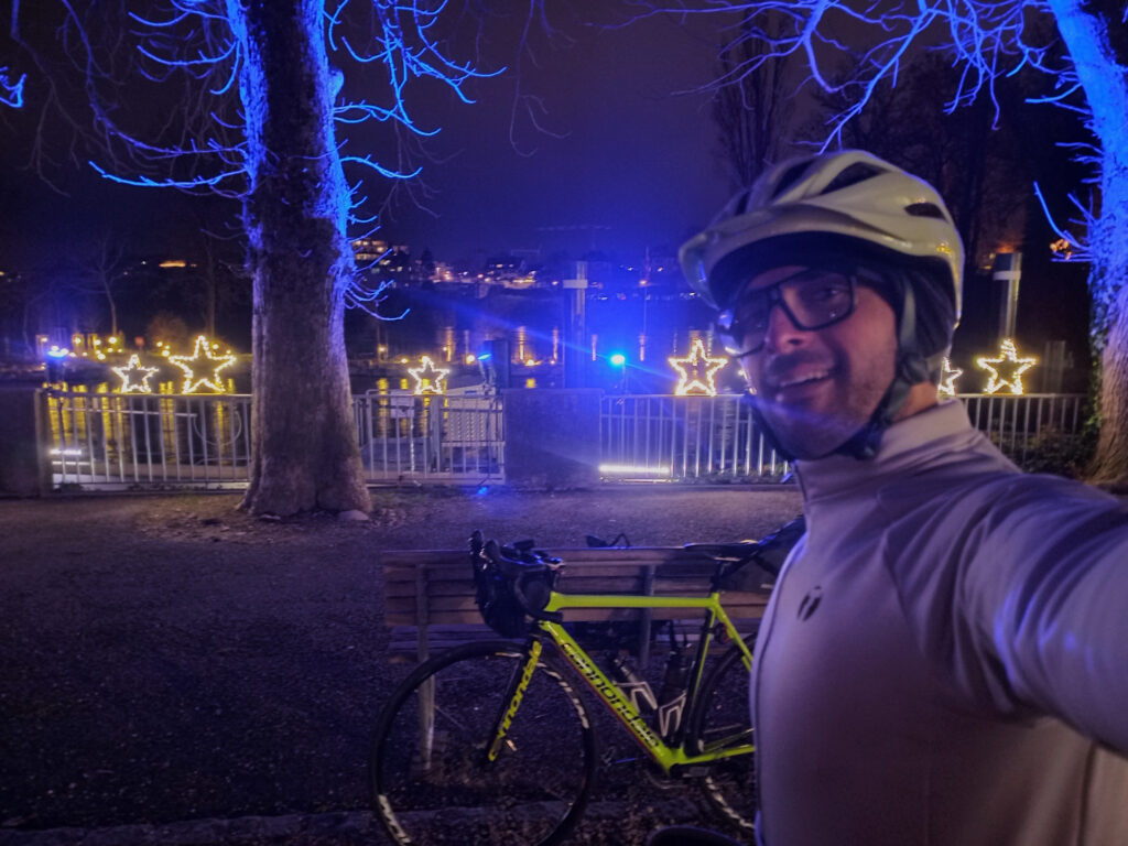 Cycling selfie with Christmas lights during a cold winter night near the Swiss-German border