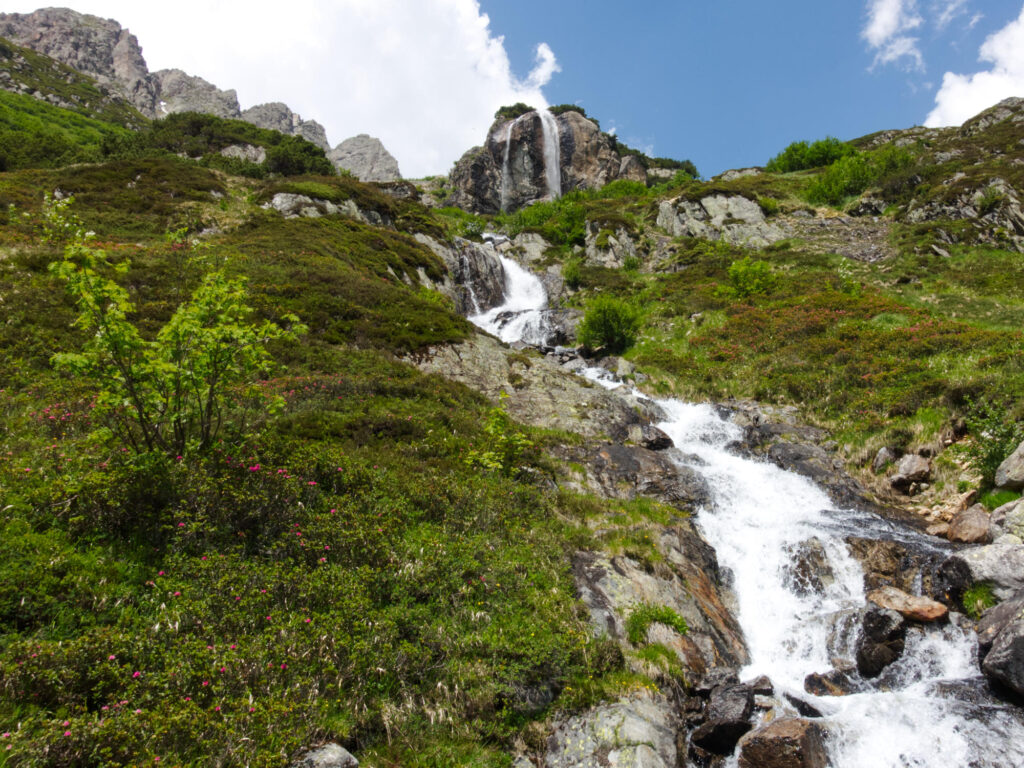 Alpine waterfall on the rocky slopes of Susten Pass.