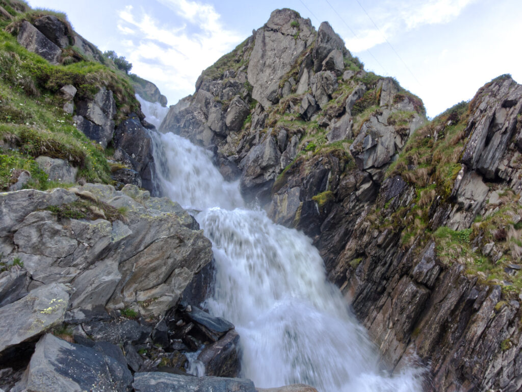 Mountain waterfall on the climb to Furka Pass.