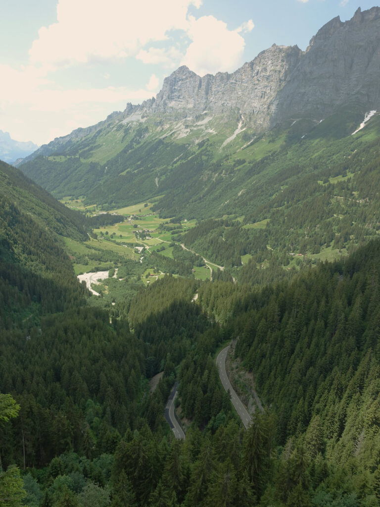 Winding road through the alpine valley on the Susten Pass climb.